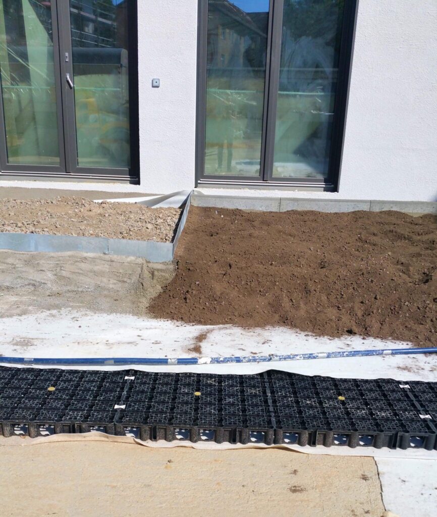 Wasserretentionsboxen auf dem Dach der Tiefgarage